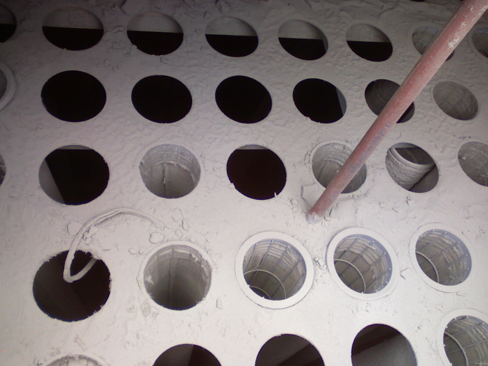 布袋式除塵器實際應用中濾袋（dài）的破損形式及原（yuán）因解密